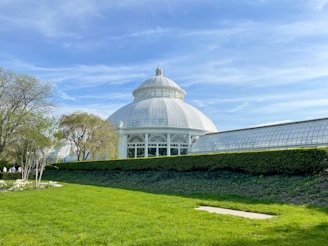 A bright, airy conservatory under a newly installed roof that looks like slate but offers modern insulation.
