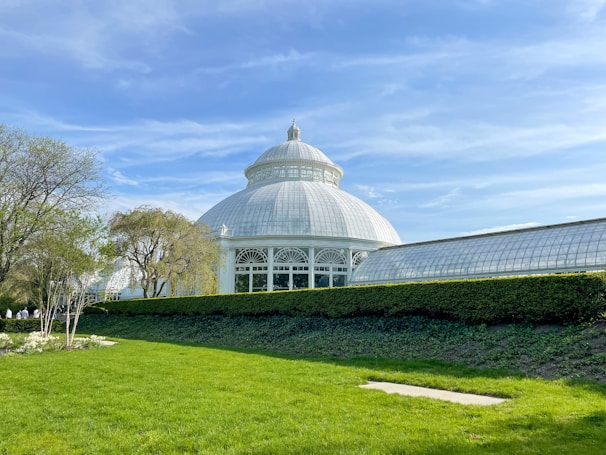 A bright, airy conservatory under a newly installed roof that looks like slate but offers modern insulation.