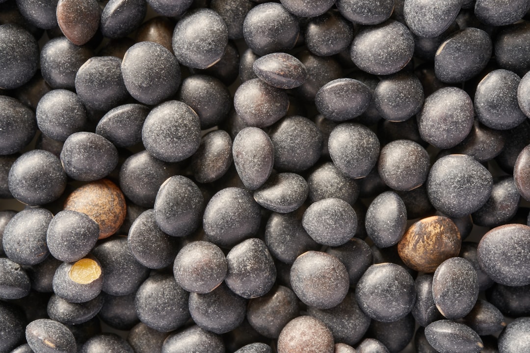 brown and gray stones on black surface