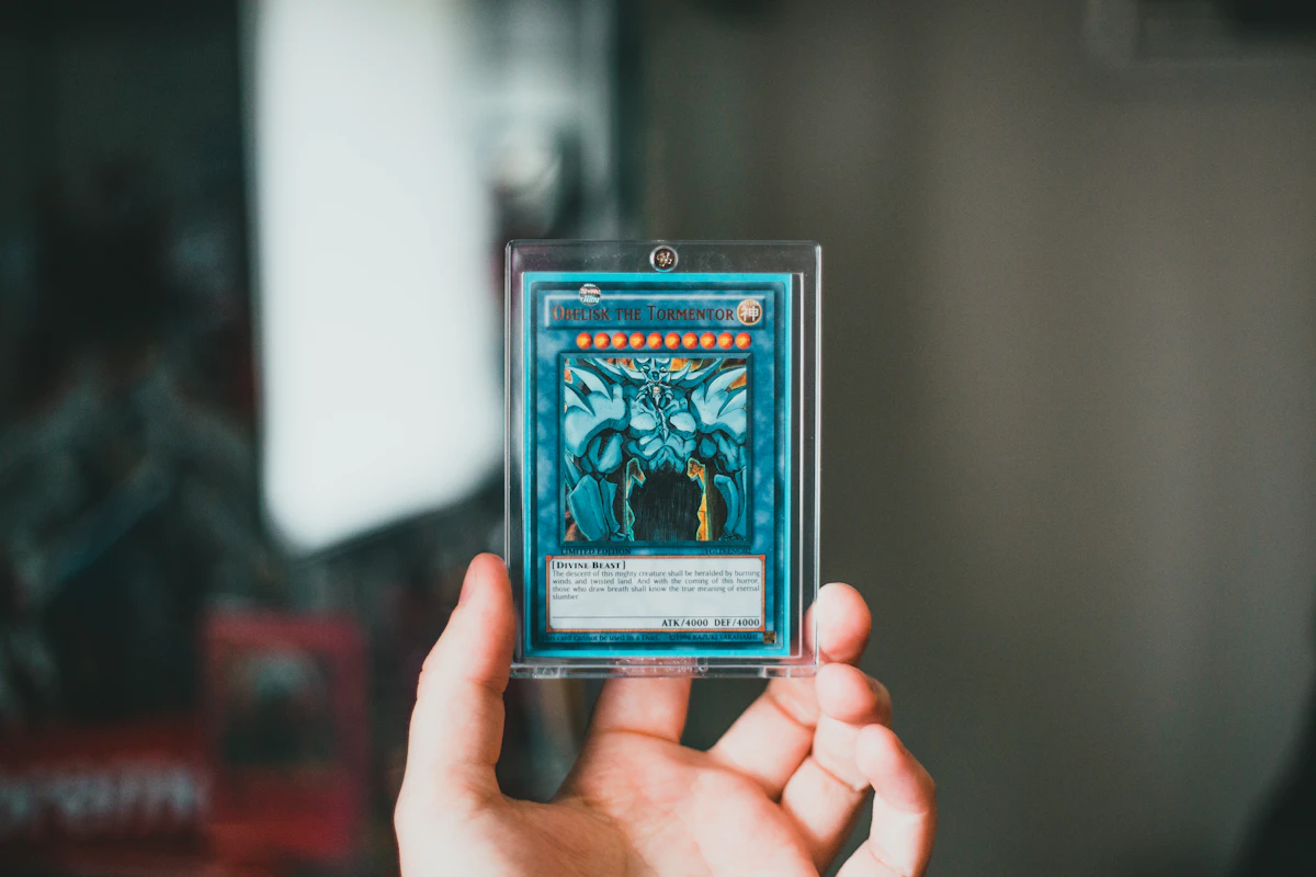 Collector holding a Magic: The Gathering trading card — photographed by Erik Mclean on Unsplash