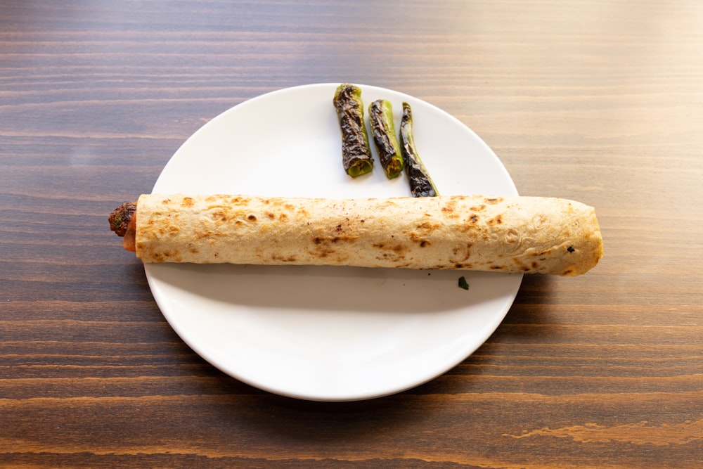 white ceramic plate with brown food