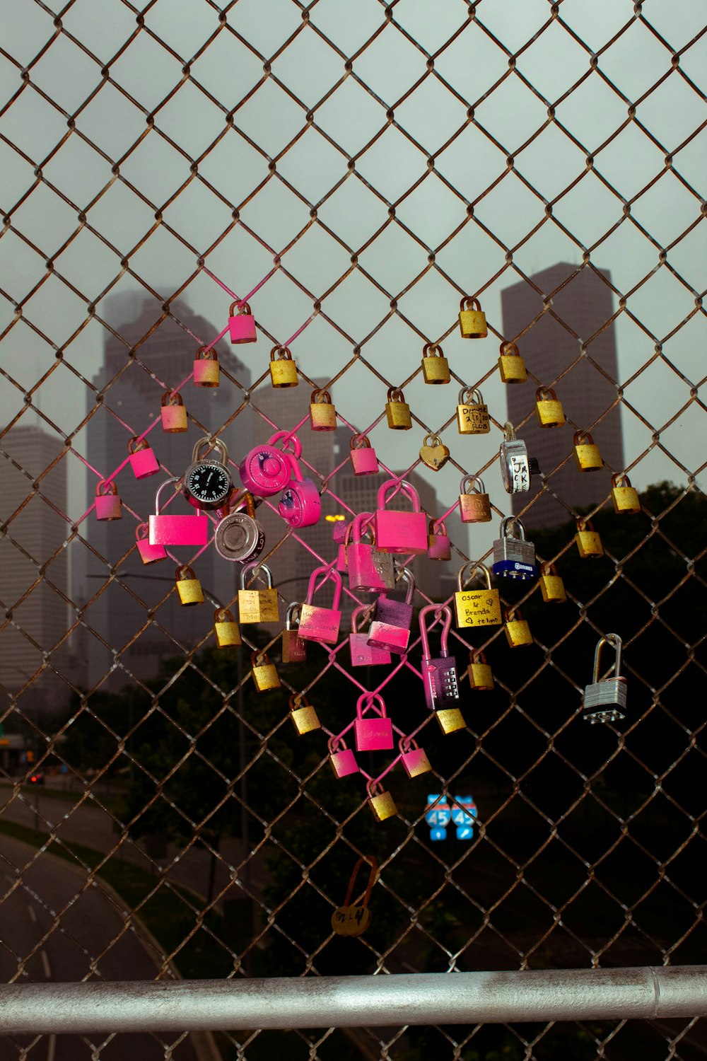 padlocks on chain link fence