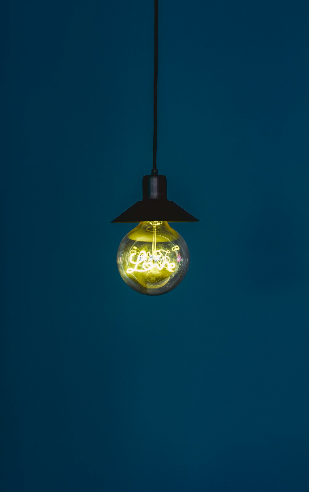 yellow and black pendant lamp