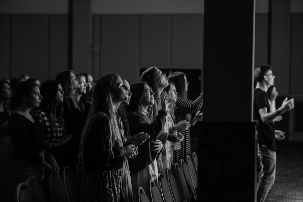 grayscale photo of people playing musical instruments