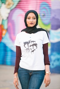 woman in white and black crew neck t-shirt