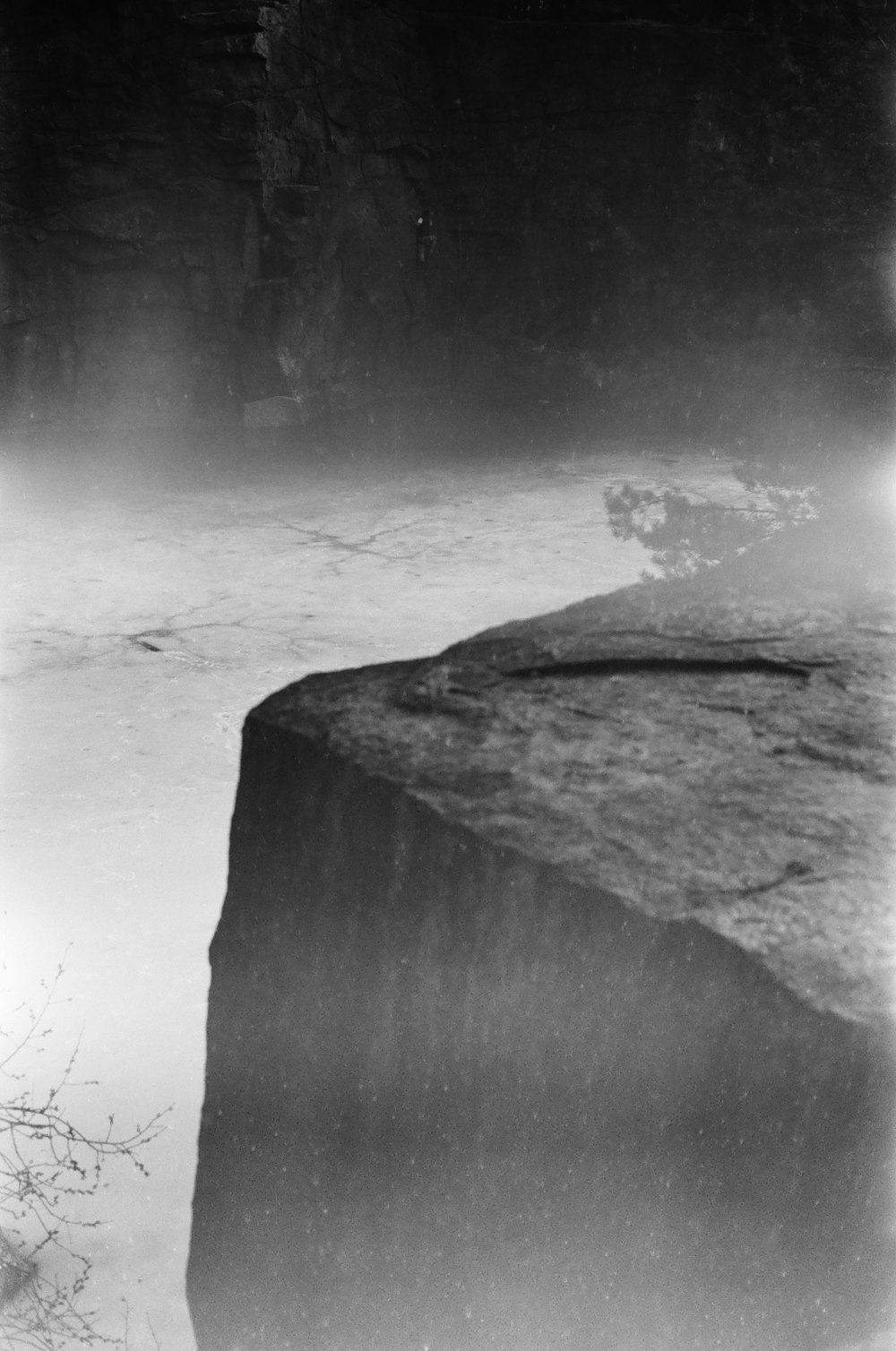 grayscale photo of rock formation