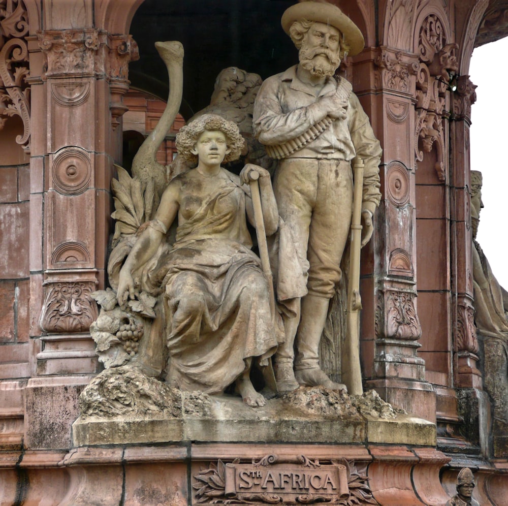 statue of man and woman