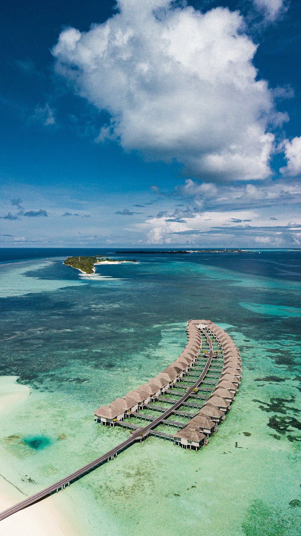 blue ocean under blue sky during daytime