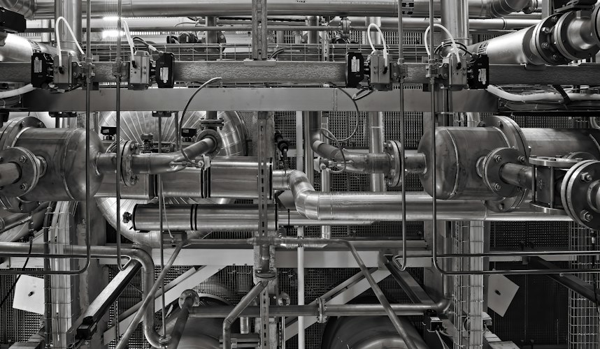 A row of finished products moving along an automated assembly line
