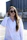 woman in white dress shirt wearing black sunglasses