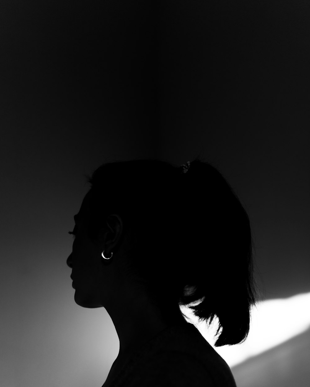 silhouette of woman with black hair