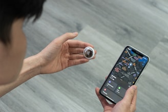 person holding black samsung android smartphone