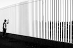 white and black wooden fence