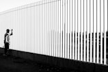 white and black wooden fence