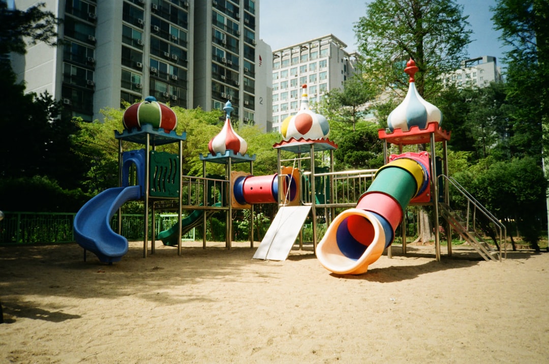 blue red and yellow playground slide,