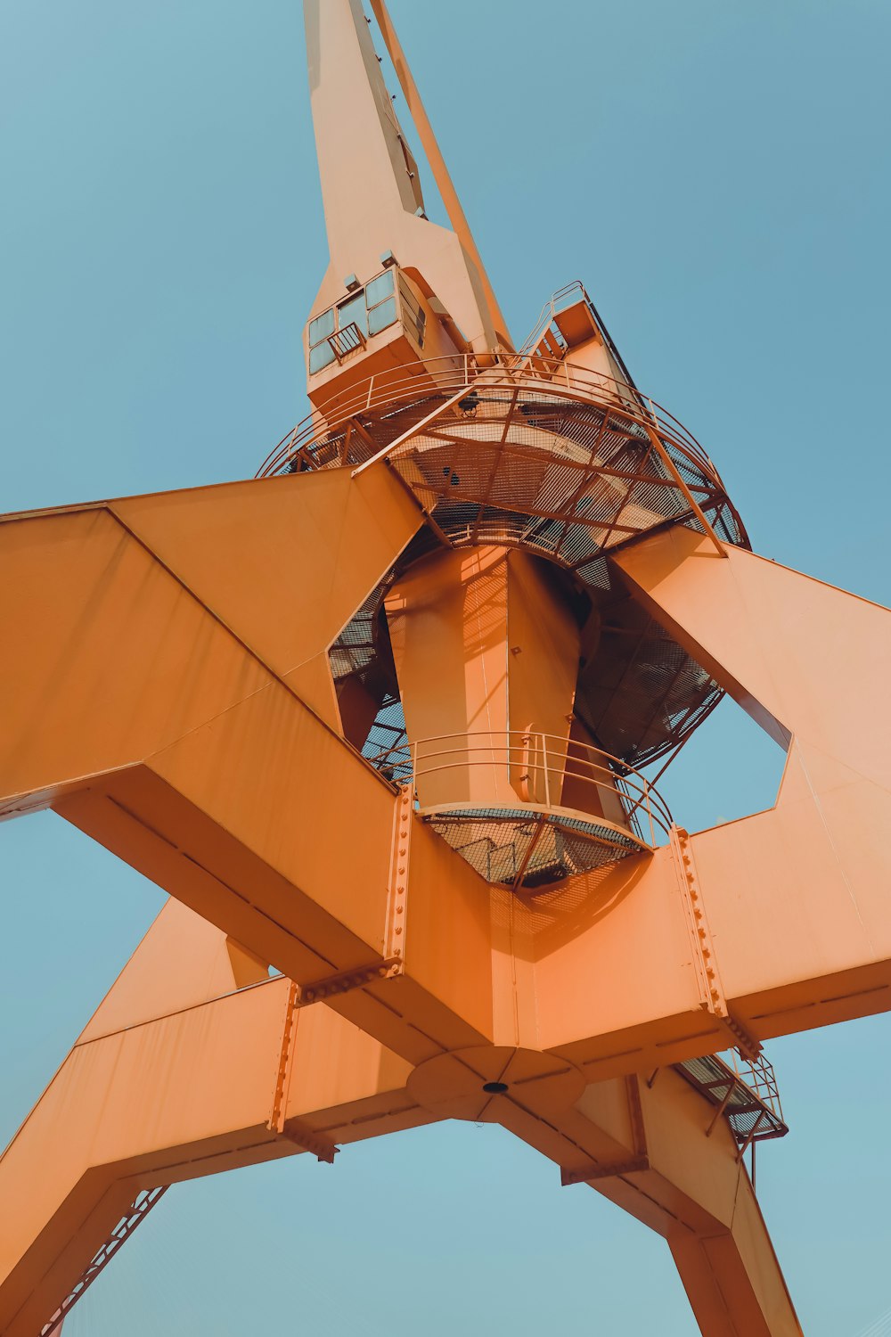 brown wooden tower under blue sky during daytime