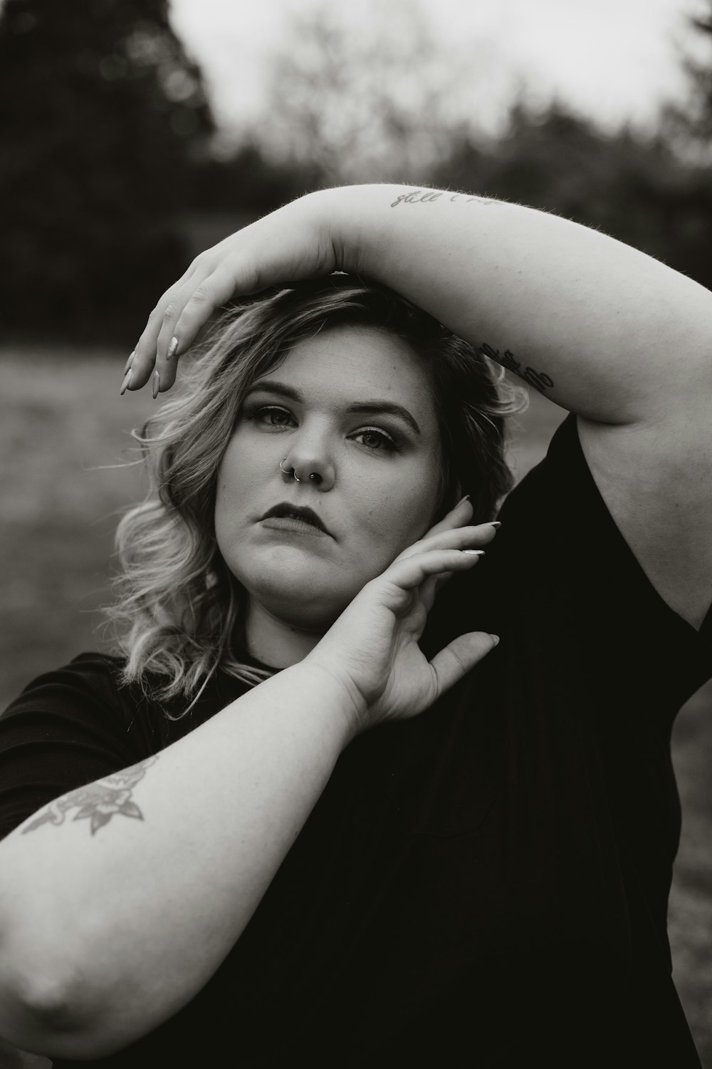 grayscale photo of woman in black shirt