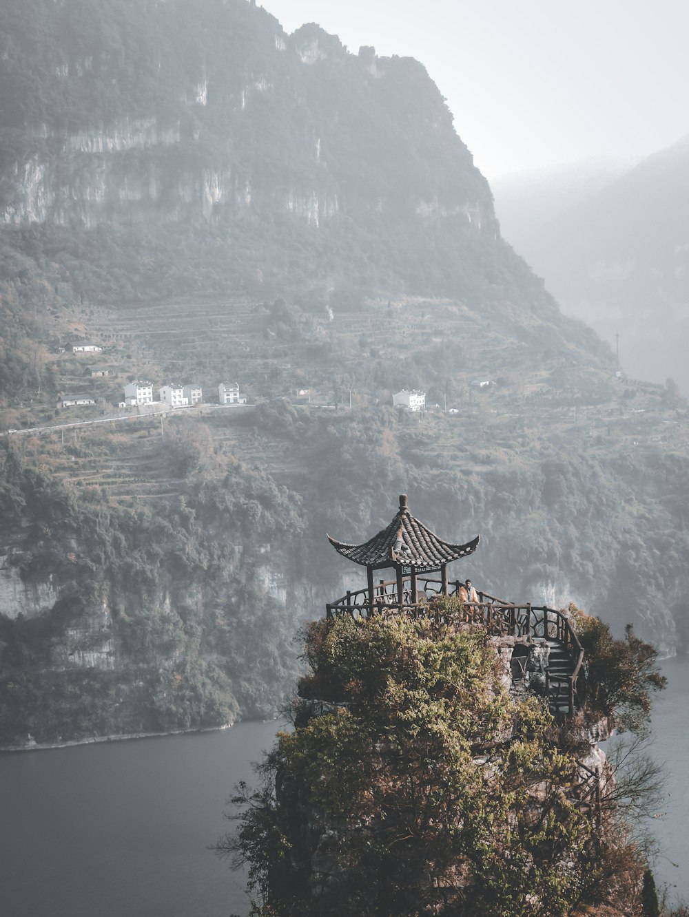 brown wooden house on top of mountain