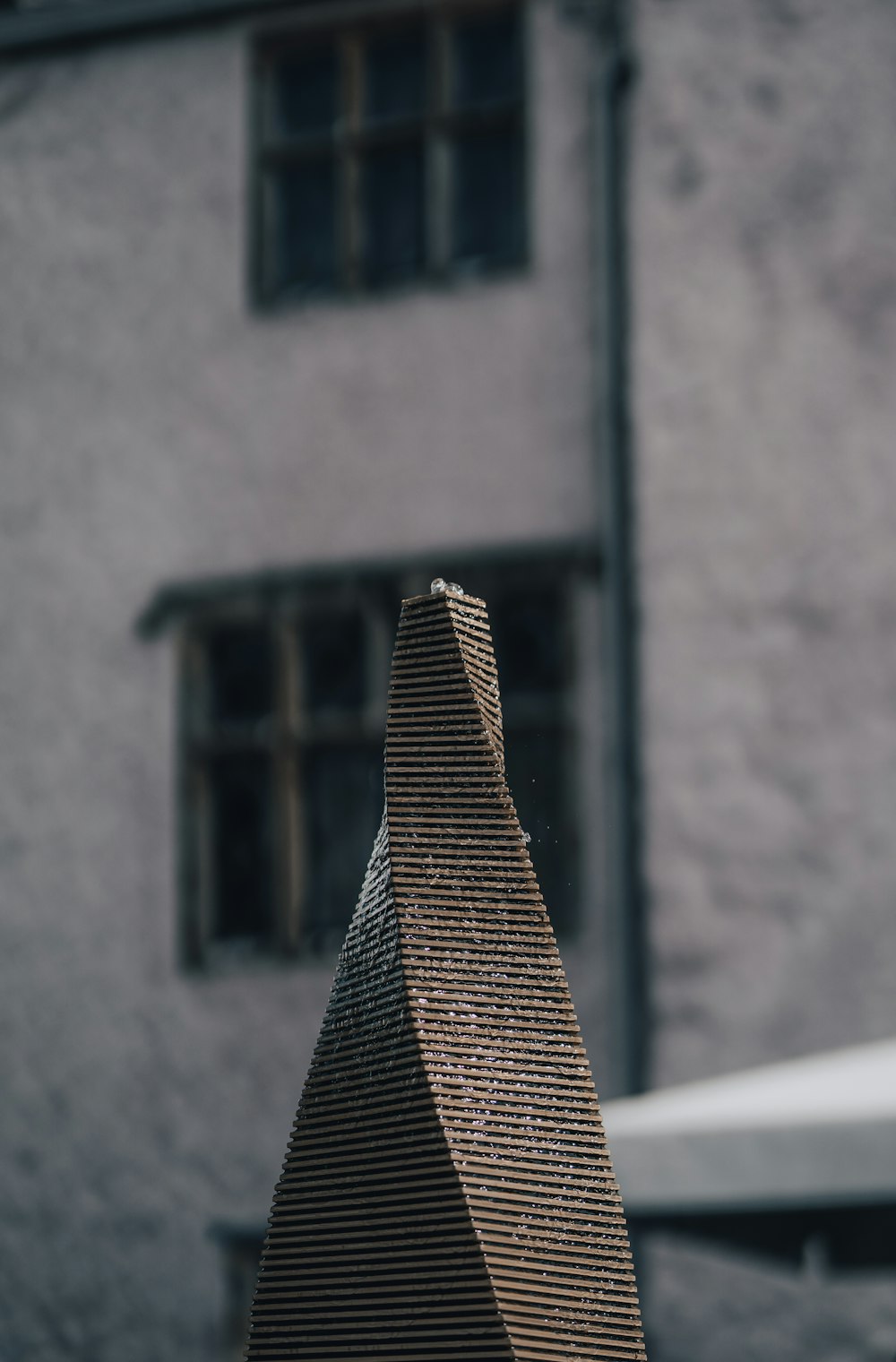 brown and white striped textile