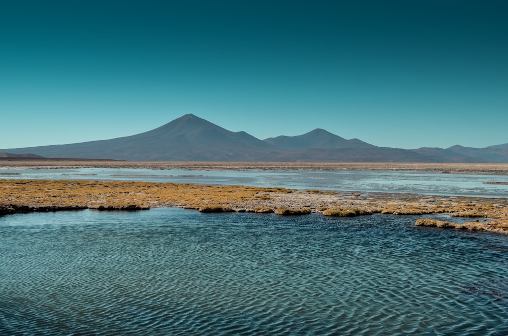 brown mountain under blue sky during daytime