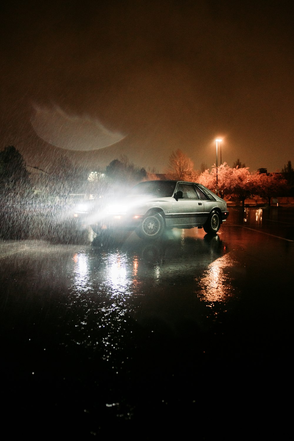 white suv on road during night time