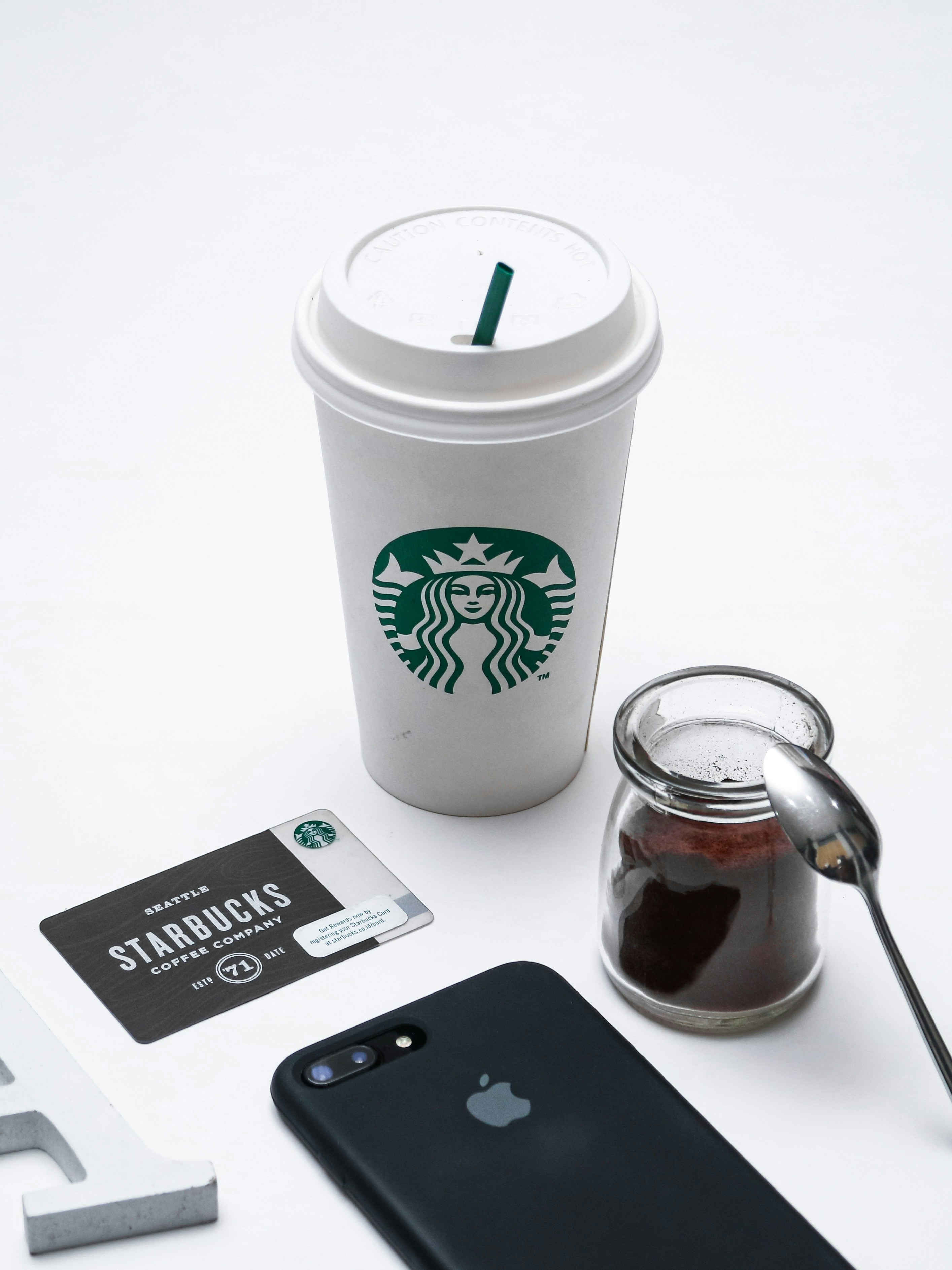 White starbucks cup beside silver iphone 6 photo Free Grey Image on