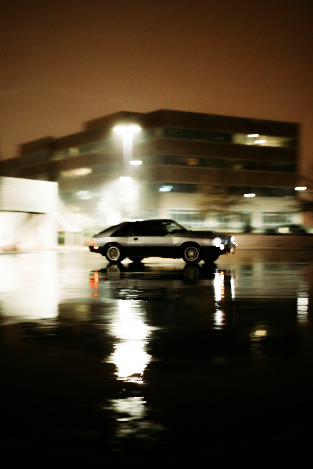 black suv on road during night time