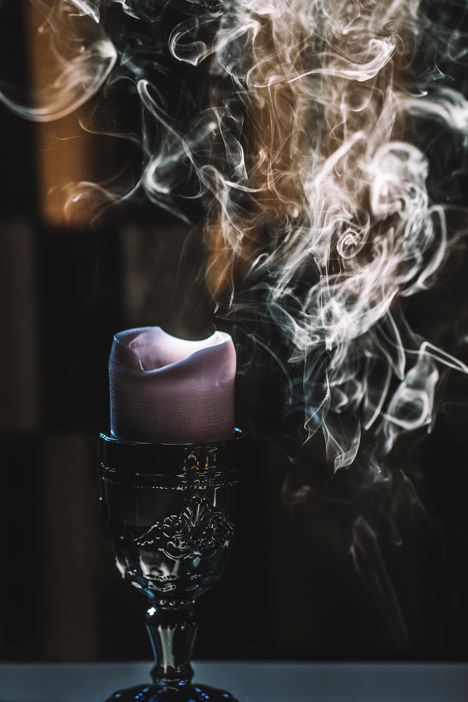 Aillebrack No. 11 just put out, the smoke still rising off the wick