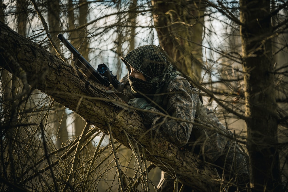 hunter with 6.5 creedmoor rifle 