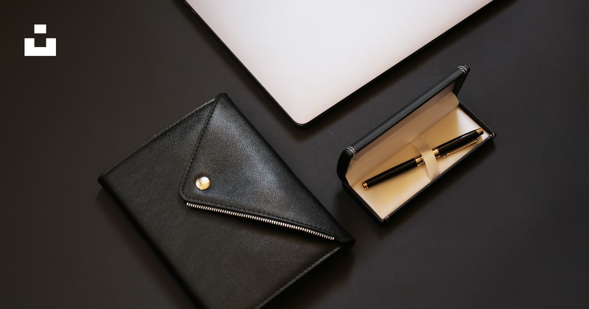 Silver macbook beside black leather wallet photo – Free Russia Image on ...