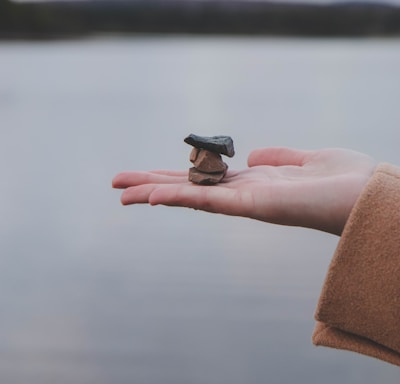 person holding black plastic tool