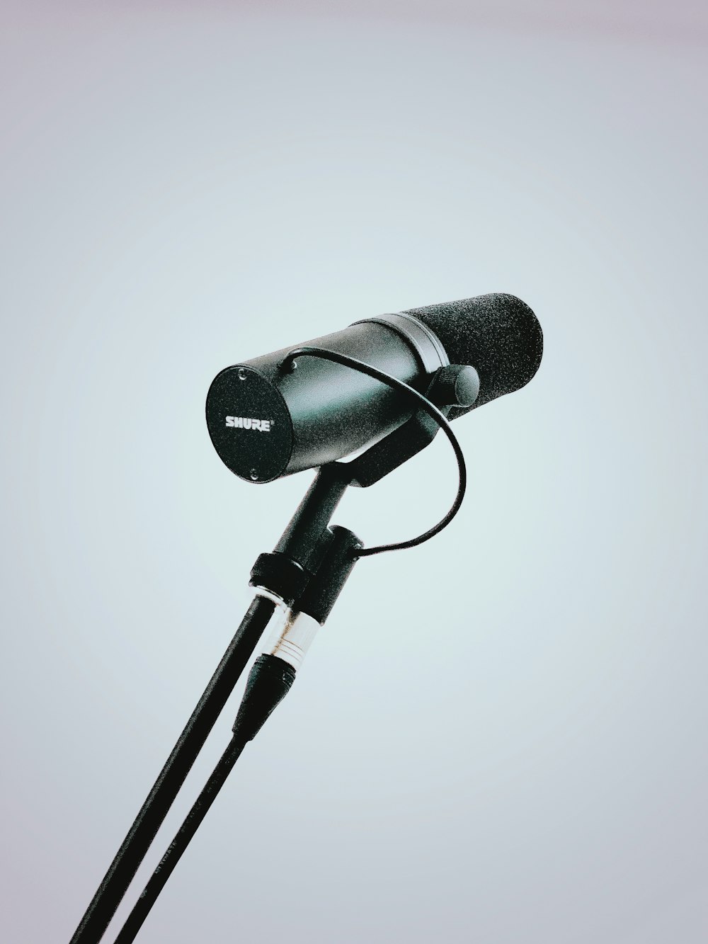 black and gray microphone on white background