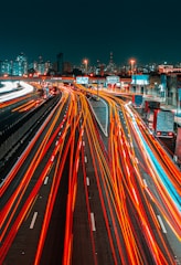 time lapse photography of cars on road during night time
