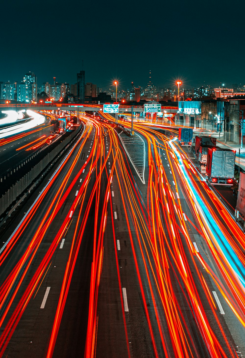 time lapse photography of cars on road during night time