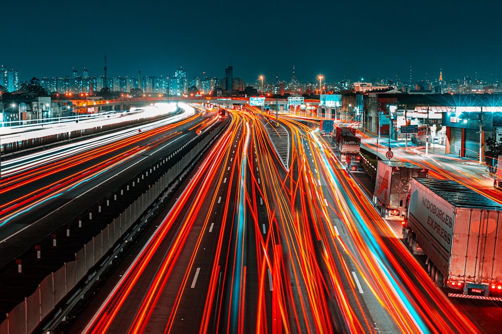 time lapse photography of cars on road during night time