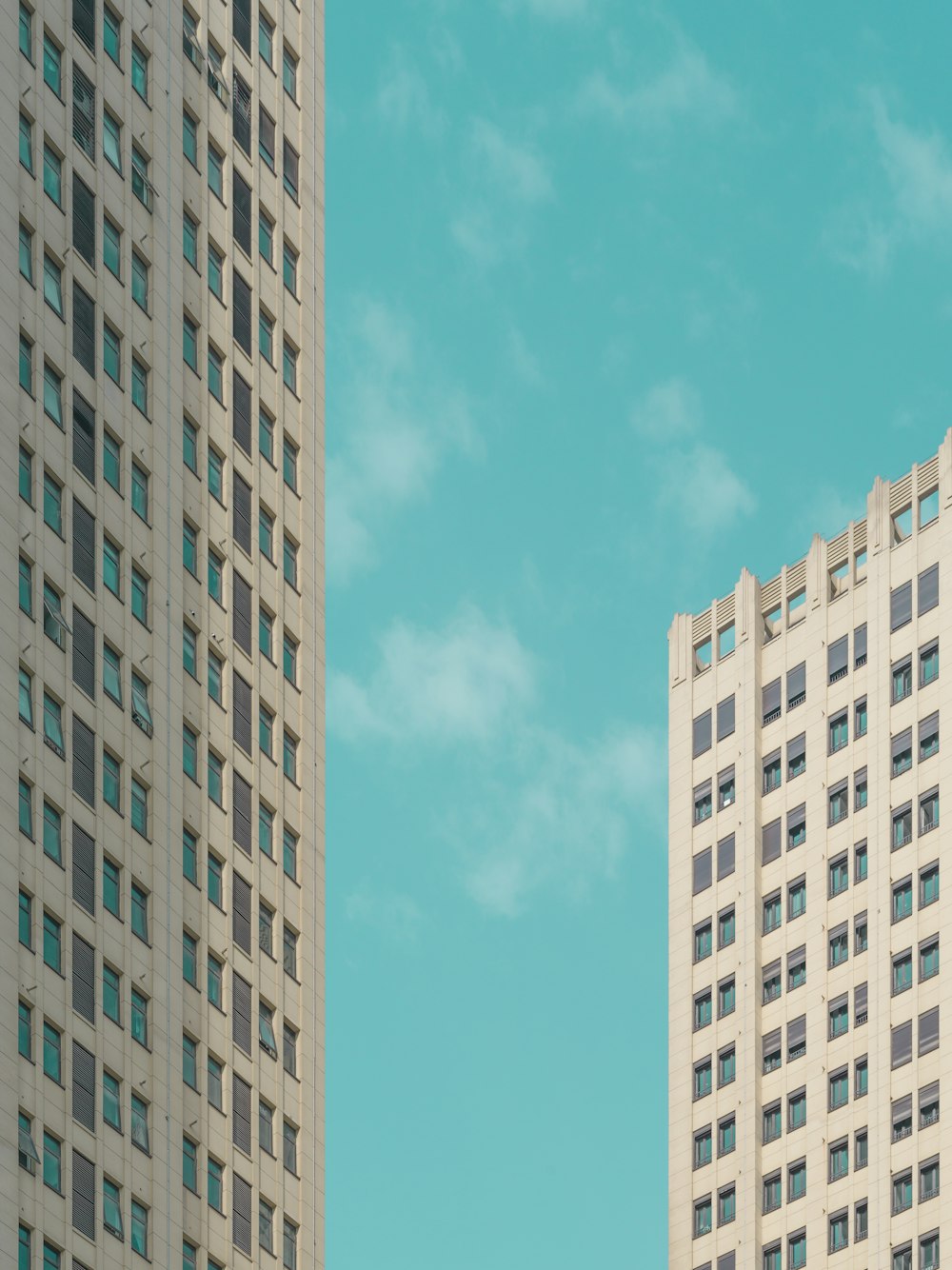 white concrete building under blue sky during daytime