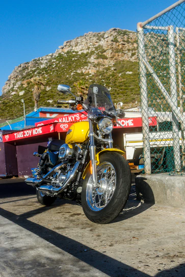 A happy customer riding a shiny Yamaha motorcycle on a sunny day in San José del Guaviare.