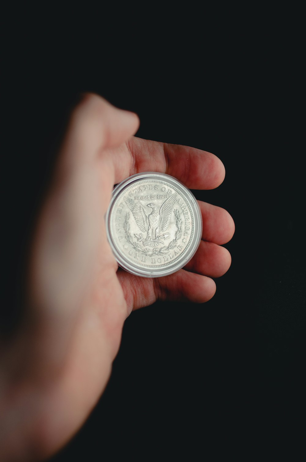 silver and white round coin