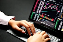 A professional team analyzing real-time digital asset market data on multiple screens.