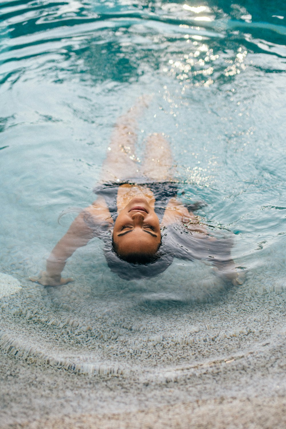 woman in water during daytime