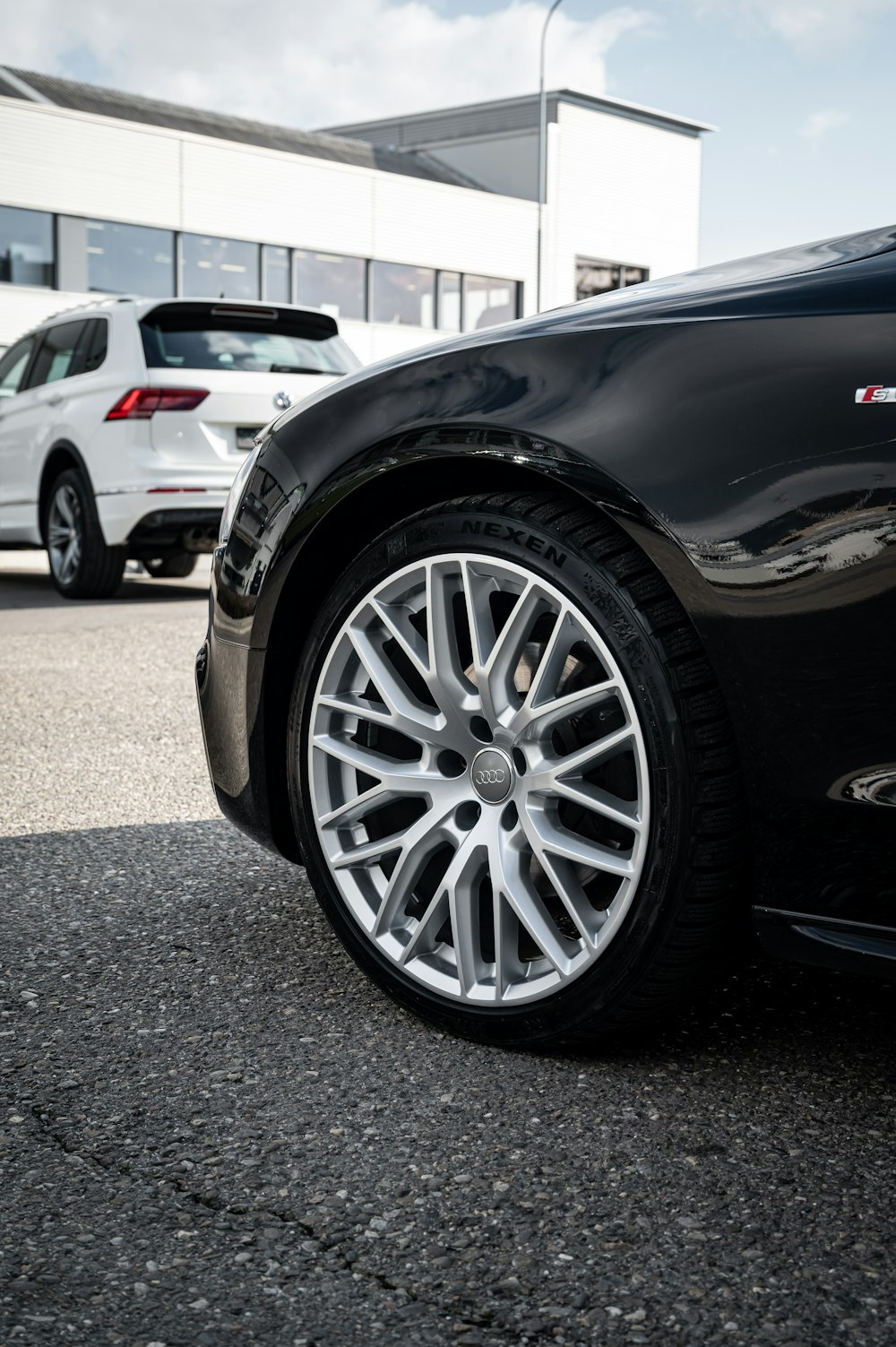 black car with silver wheel