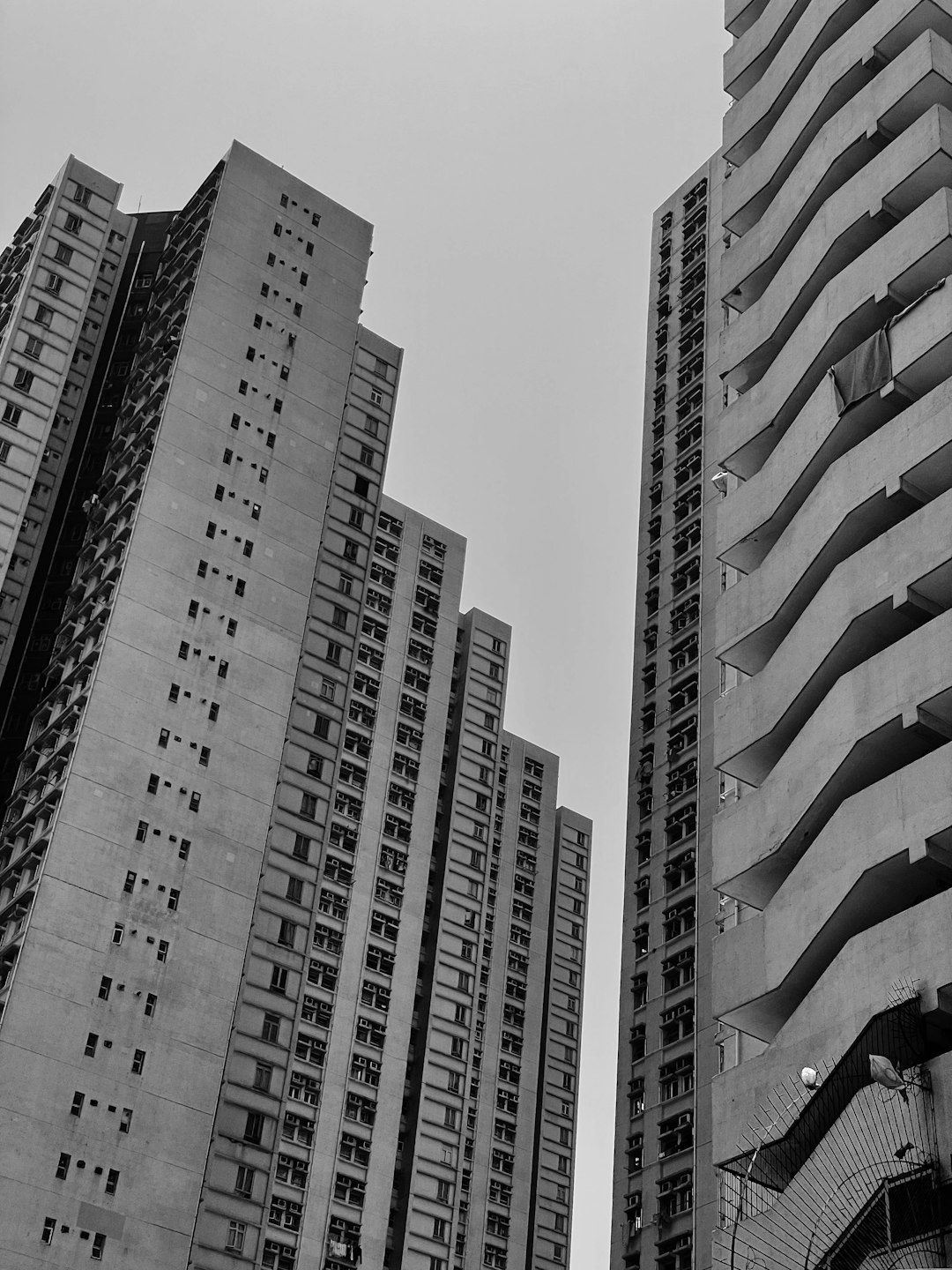 grayscale photo of high rise buildings