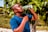 A vibrant image of a young person enjoying a refreshing drink outdoors.
