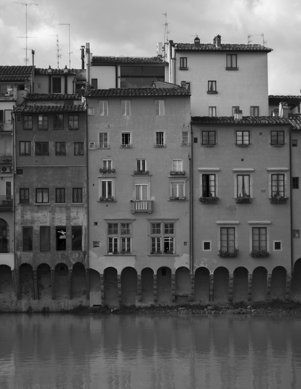 grayscale photo of concrete building