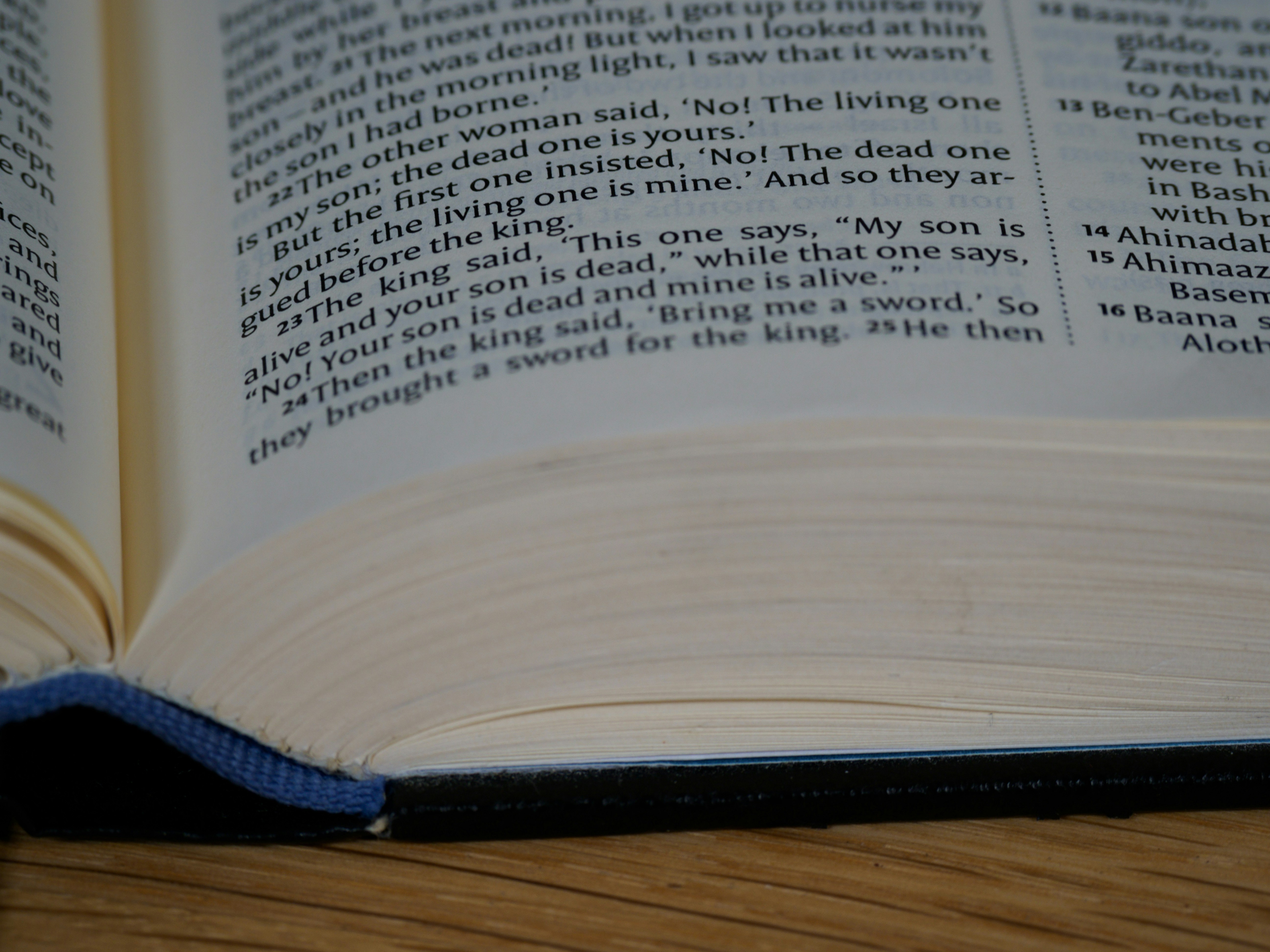 white book page on brown wooden table
