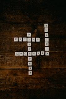 white and black wooden letter m