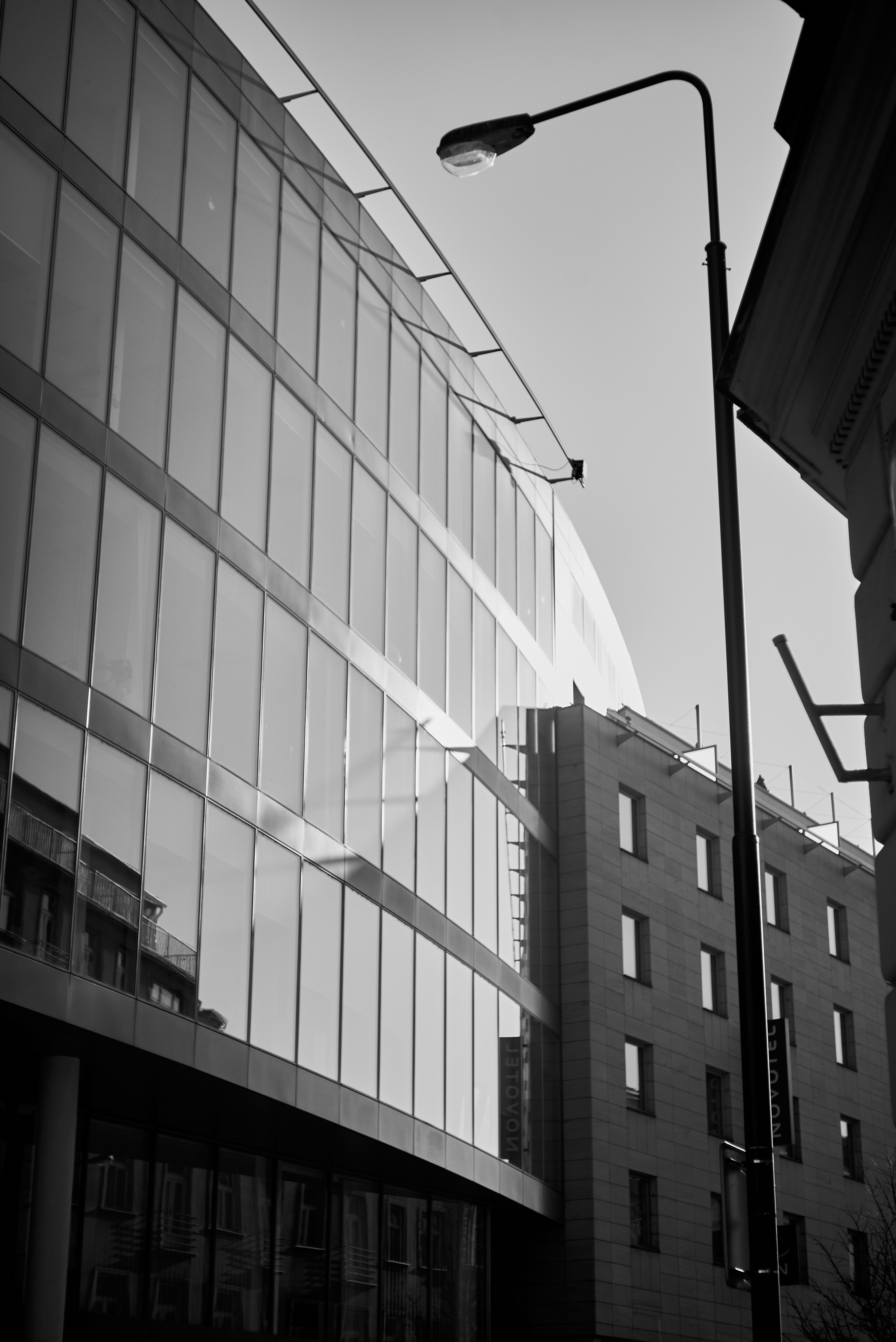 grayscale photo of high rise building
