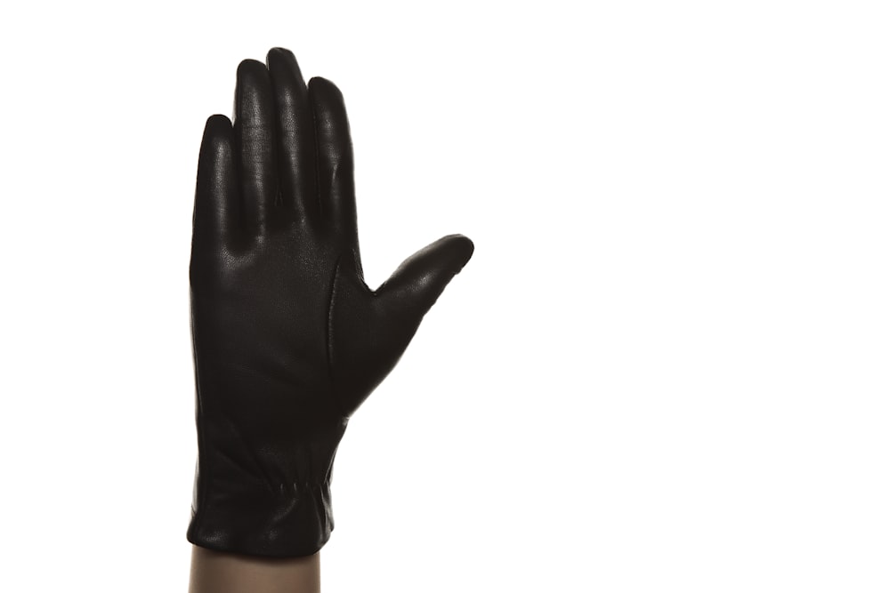 person in black gloves and black stockings