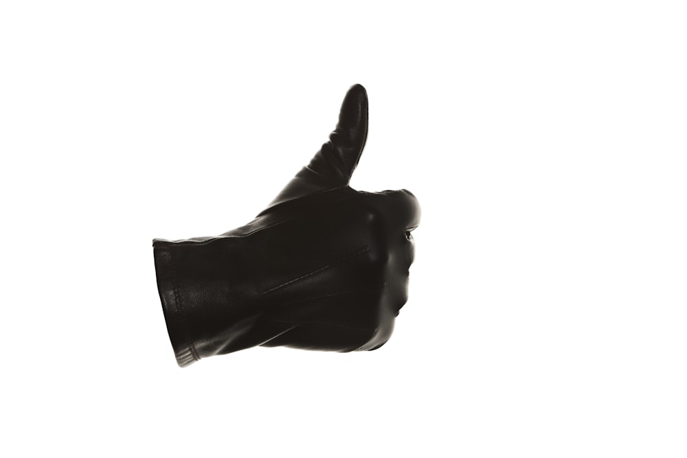 white hand with black background