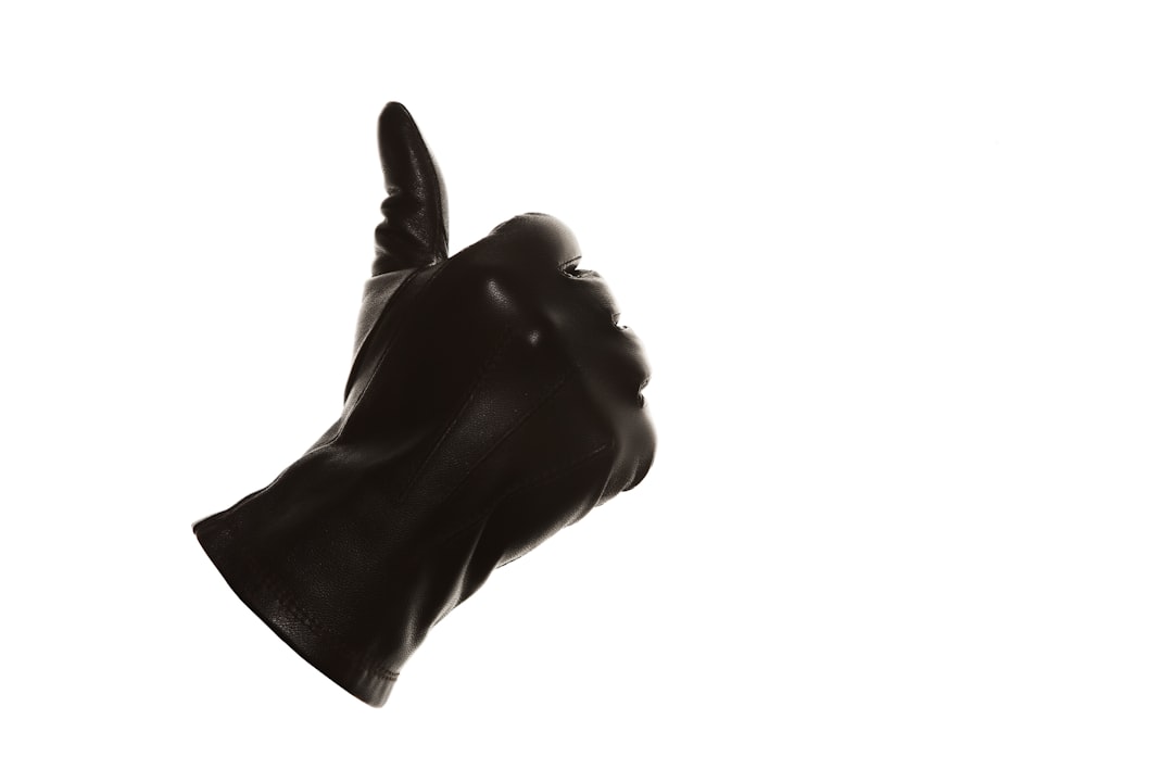 persons right hand with black background